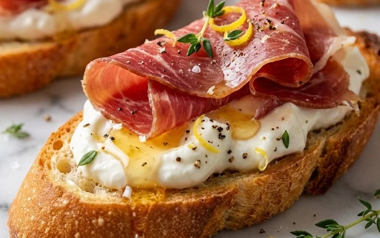 Beef Prosciutto Crostini with Burrata and Lemon Honey Drizzle